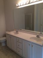 4448 Pheasant Ridge Road, Unit 303 Roanoke, VA 24014 - Photo 7 of 8 a bathroom with a sink and toilet