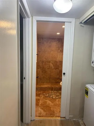 a bathroom with a sink toilet and mirror