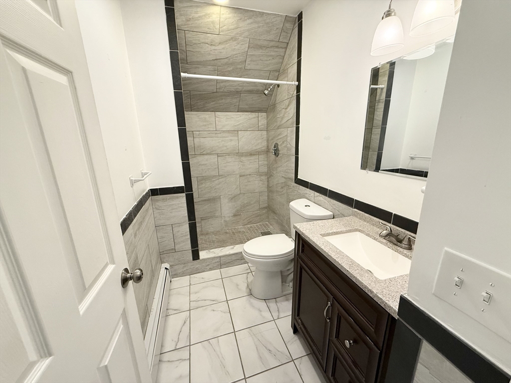 592 Westminster Hill Road Fitchburg, MA 01420 - Photo 13 of 21 a bathroom with a toilet sink and mirror