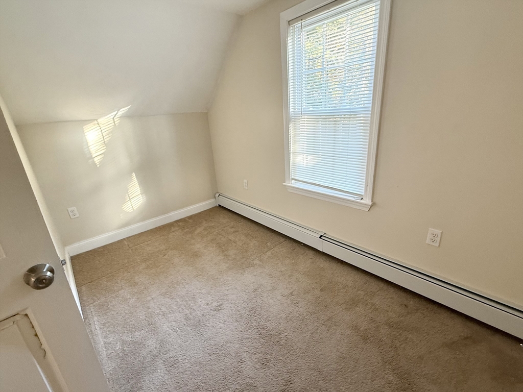 592 Westminster Hill Road Fitchburg, MA 01420 - Photo 17 of 21 an empty room with a window
