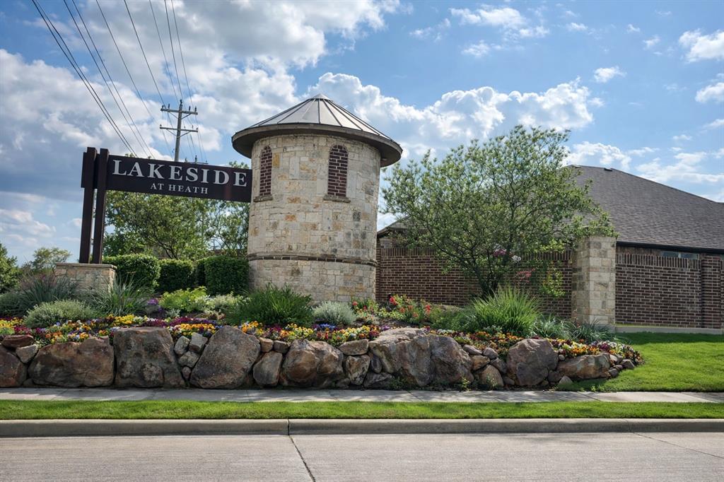 3106 Maverick Drive Forney, TX 75126 - Photo 20 of 32 a front view of a house with a garden