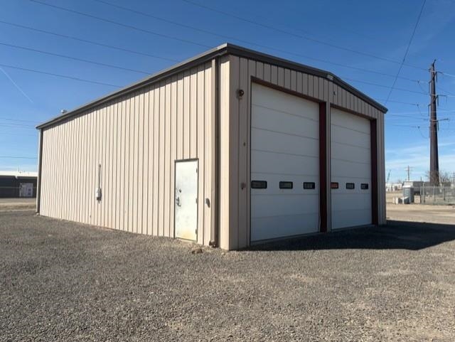 760 21 1/2 Road Grand Junction, CO 81505 - Photo 6 of 7 a view of an empty room with a garage