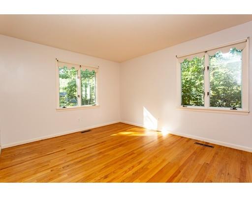 141 Brooks Road Longmeadow, MA 01106 - Photo 12 of 25 a view of an empty room with wooden floor and a window