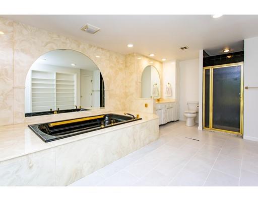 141 Brooks Road Longmeadow, MA 01106 - Photo 18 of 25 a bathroom with a double vanity sink and a mirror