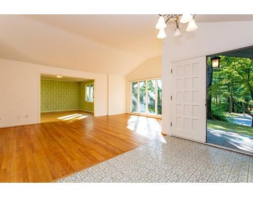 141 Brooks Road Longmeadow, MA 01106 - Photo 2 of 25 a view of empty room with wooden floor and fan