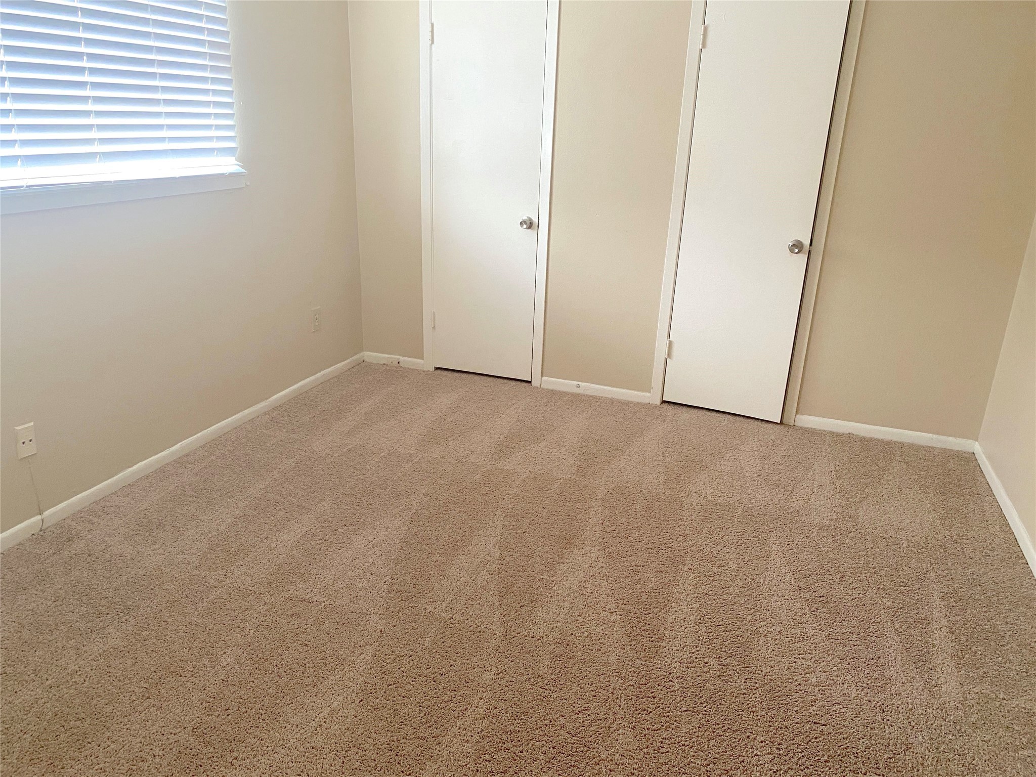 1403 Blalock Road, Unit 12 Houston, TX 77055 - Photo 12 of 15 a view of an empty room and a window