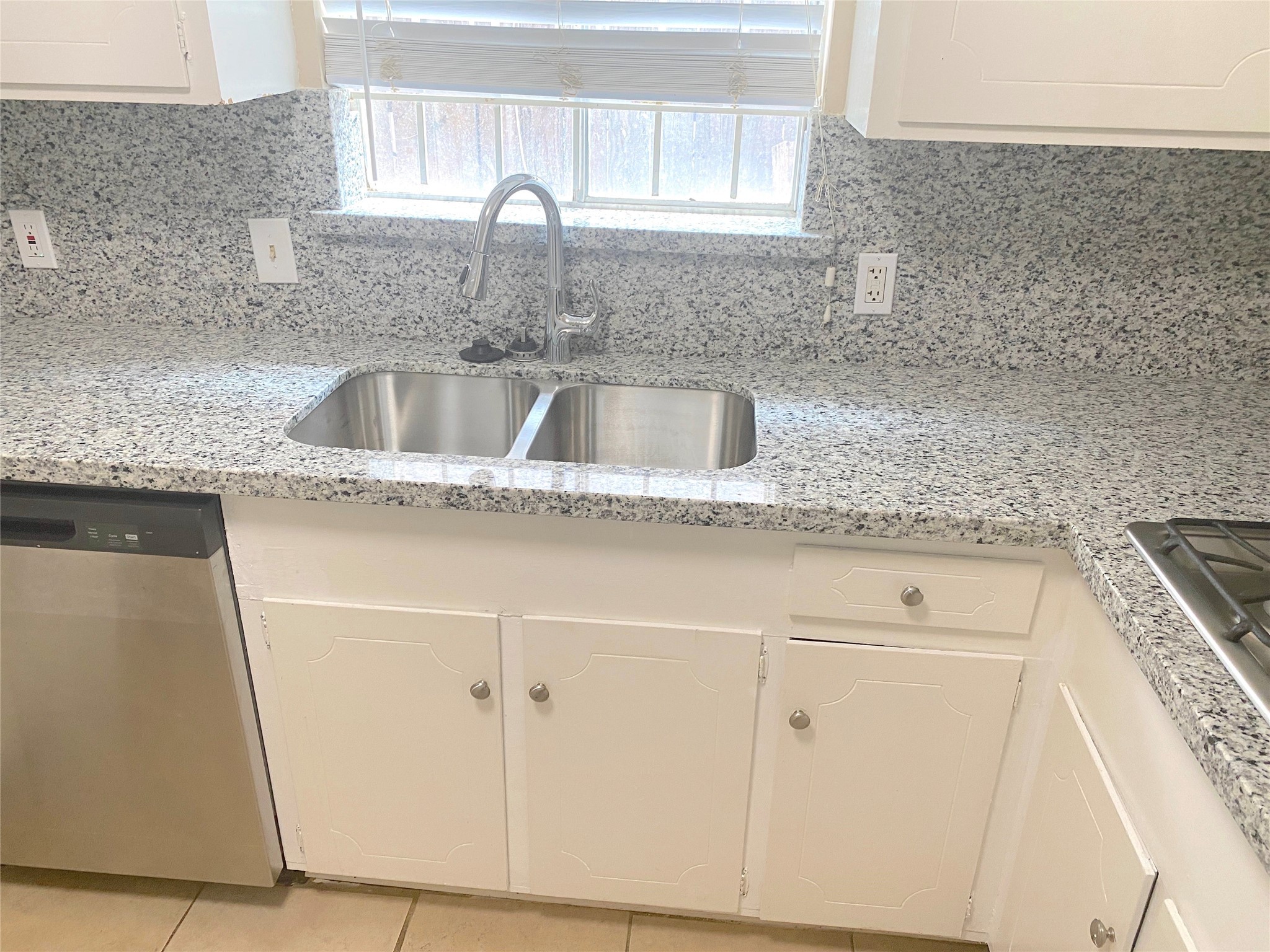 1403 Blalock Road, Unit 12 Houston, TX 77055 - Photo 5 of 15 a close view of a sink and granite counter top a sink
