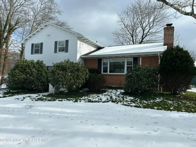 a view of road covered with snow
