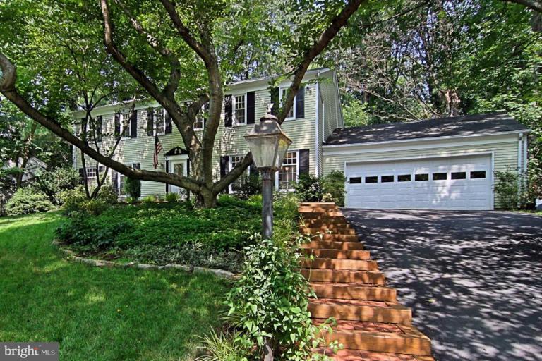 11412 Running Cedar Road Reston, VA 20191 - Photo 1 of 18 a view of a house with a yard
