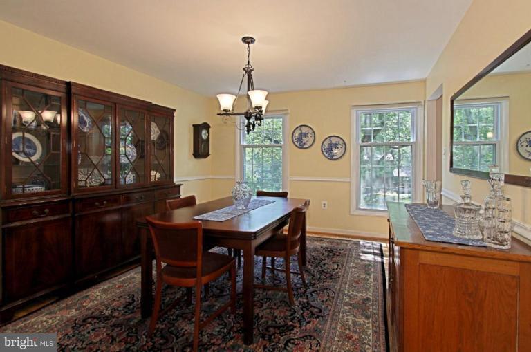 11412 Running Cedar Road Reston, VA 20191 - Photo 15 of 18 a view of a dining room with furniture window and outside view