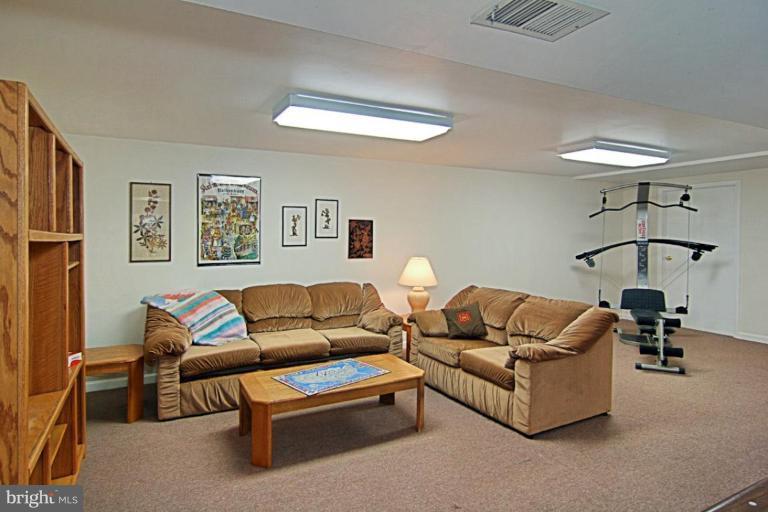 11412 Running Cedar Road Reston, VA 20191 - Photo 6 of 18 a living room with furniture