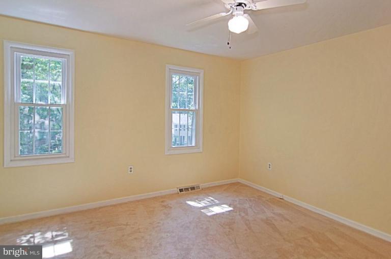 11412 Running Cedar Road Reston, VA 20191 - Photo 9 of 18 a view of an empty room with a window