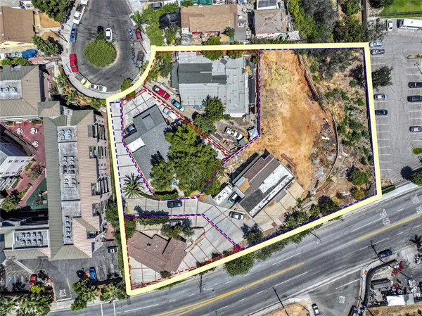 an aerial view of a city with lots of residential buildings