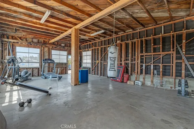 a view of a house with backyard and porch