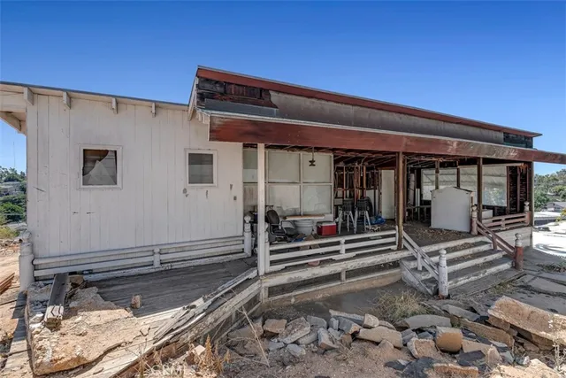 a view of a backyard of a house