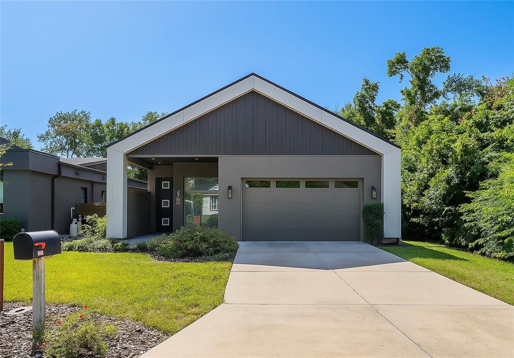2514 Shannon Road Orlando, FL 32806 - Photo 1 of 53 a front view of house with yard and green space