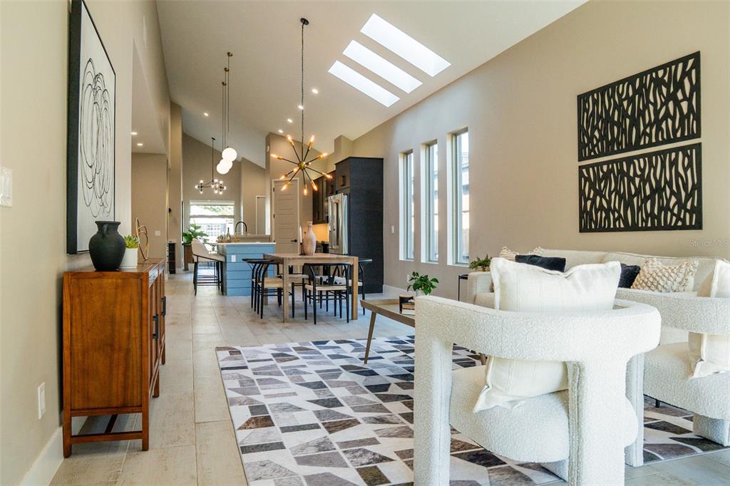 2514 Shannon Road Orlando, FL 32806 - Photo 20 of 53 a living room with furniture and a chandelier