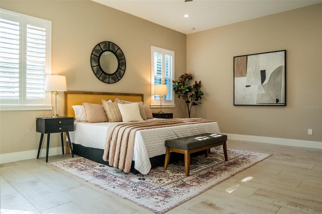 2514 Shannon Road Orlando, FL 32806 - Photo 26 of 53 a bedroom with a bed and a chandelier