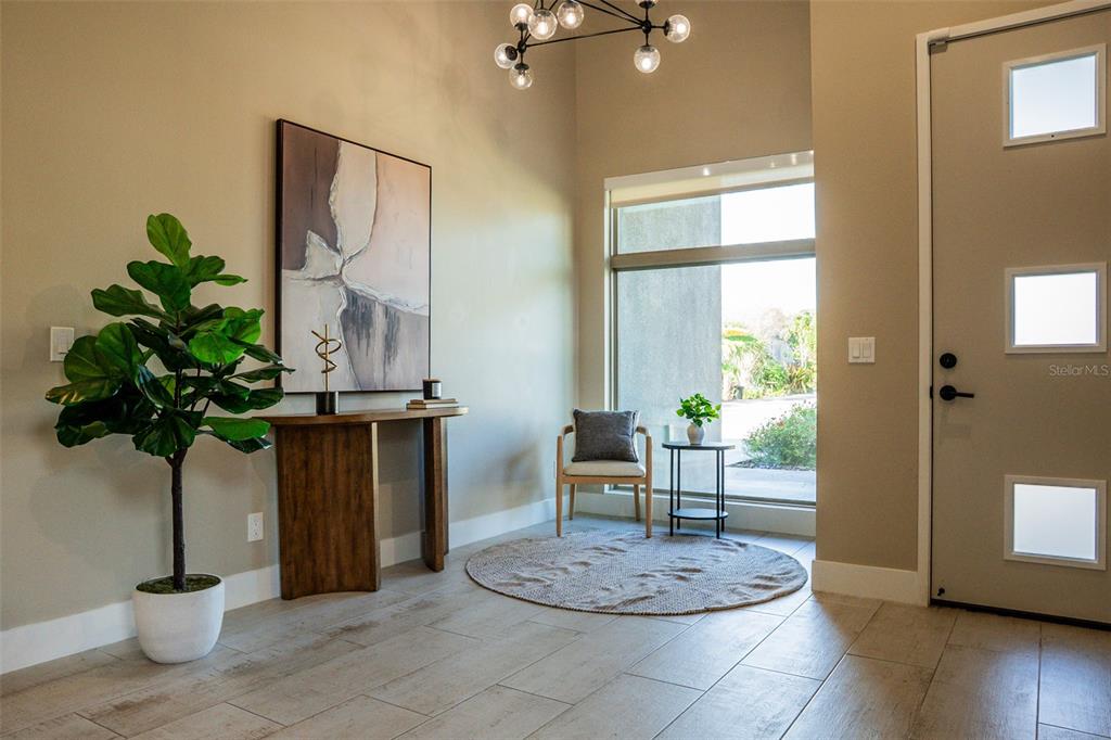 2514 Shannon Road Orlando, FL 32806 - Photo 6 of 53 a view of a livingroom with furniture and a potted plant