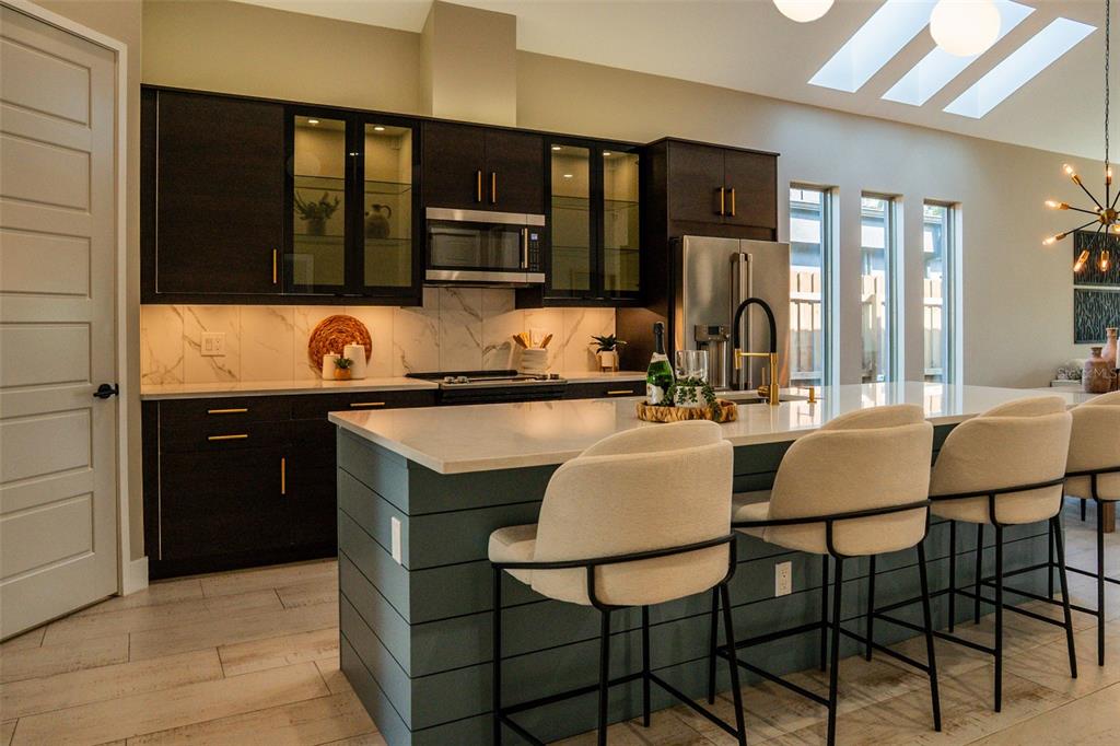 2514 Shannon Road Orlando, FL 32806 - Photo 7 of 53 a kitchen with a sink cabinets and window