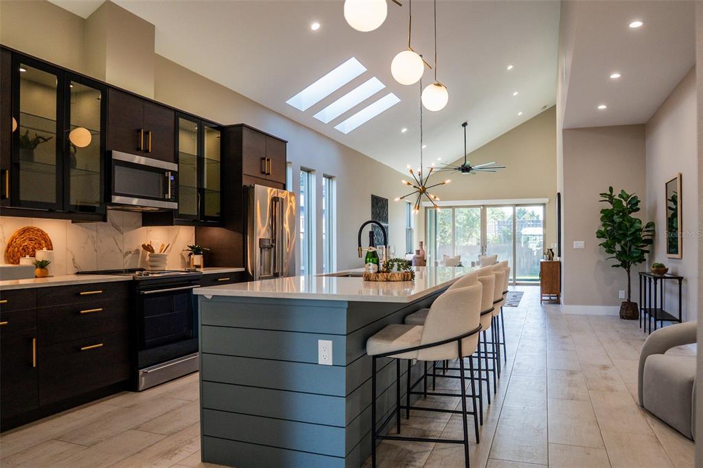 2514 Shannon Road Orlando, FL 32806 - Photo 9 of 53 a kitchen with granite countertop lots of counter top space