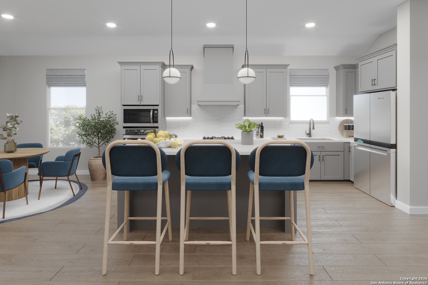 a kitchen with kitchen island granite countertop wooden cabinets and stainless steel appliances
