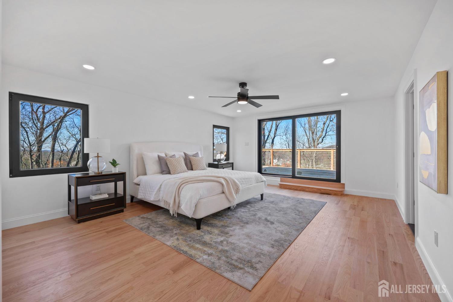 120 Nolan Road Morganville, NJ 07751 - Photo 22 of 85 a spacious bedroom with a large bed and a window