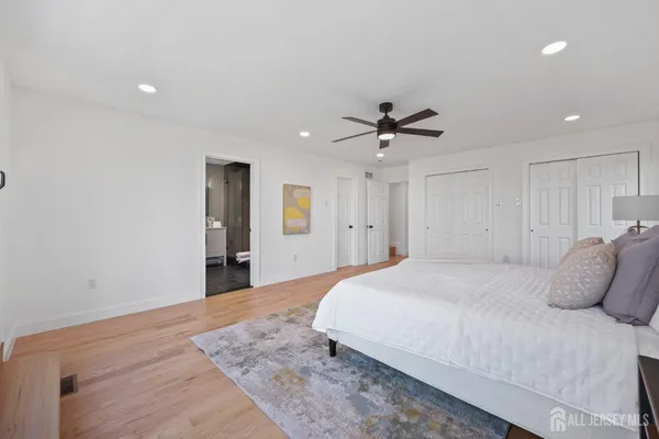 a view of balcony with wooden floor and fence