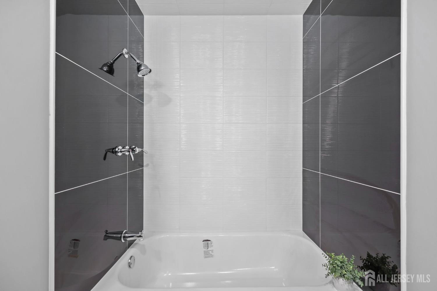 120 Nolan Road Morganville, NJ 07751 - Photo 35 of 85 a bathroom with a bathtub