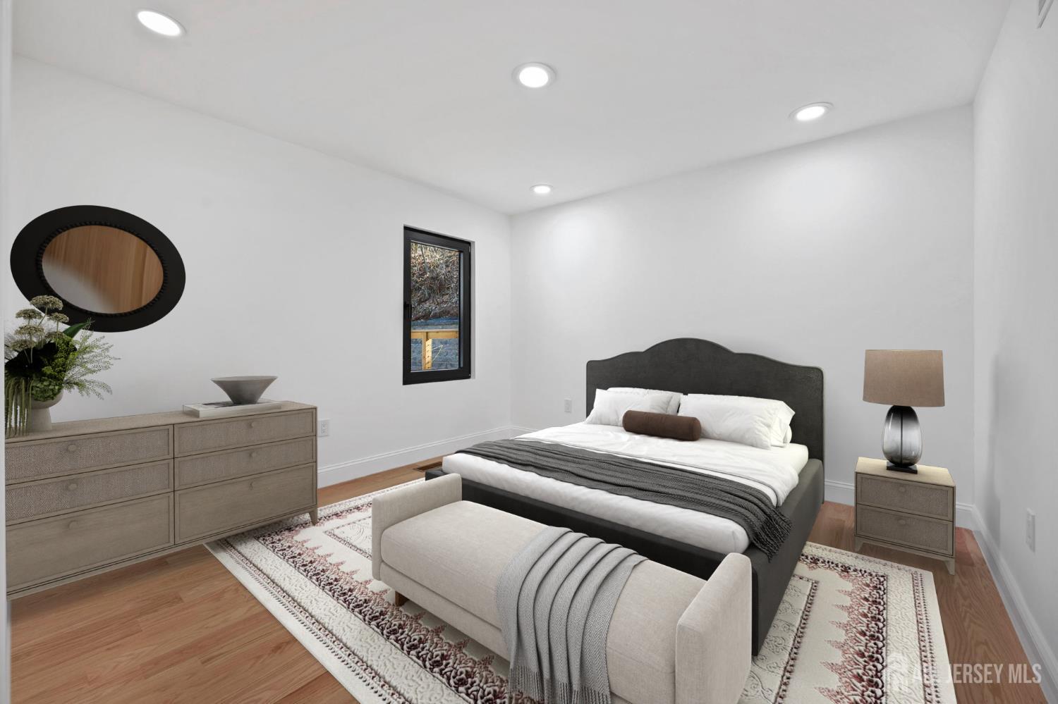 120 Nolan Road Morganville, NJ 07751 - Photo 36 of 85 a bedroom with a bed and a couch