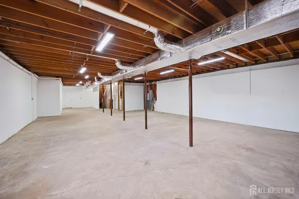 a view of a wooden floor with a pot