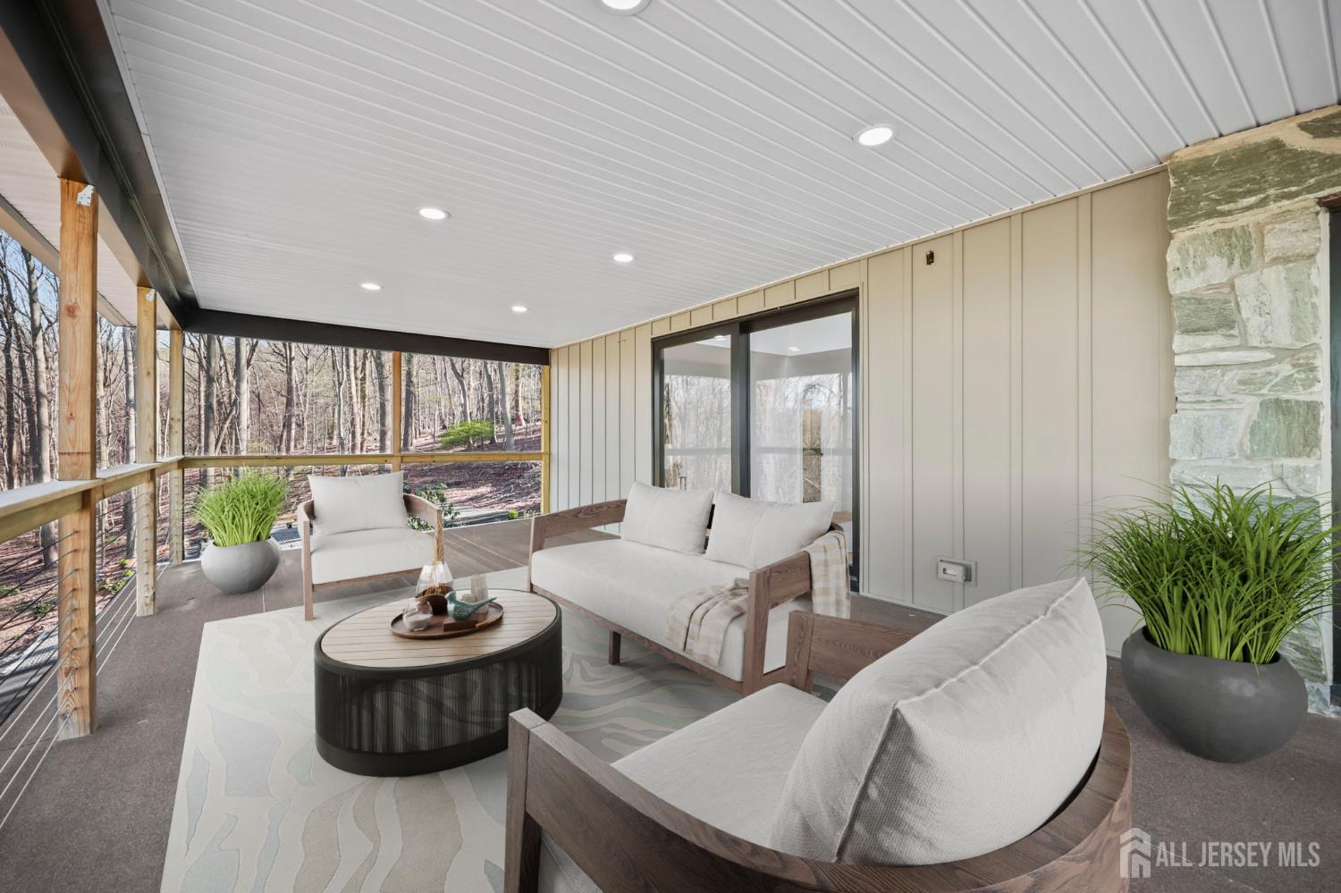 120 Nolan Road Morganville, NJ 07751 - Photo 44 of 85 a living room with furniture and a potted plant