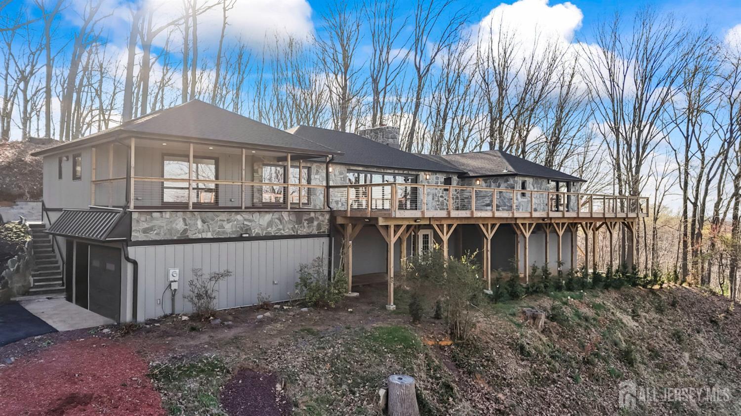 120 Nolan Road Morganville, NJ 07751 - Photo 57 of 85 a front view of a house with parking area