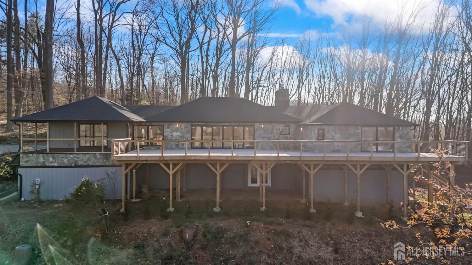 120 Nolan Road Morganville, NJ 07751 - Photo 58 of 85 a front view of a house with balcony and garden