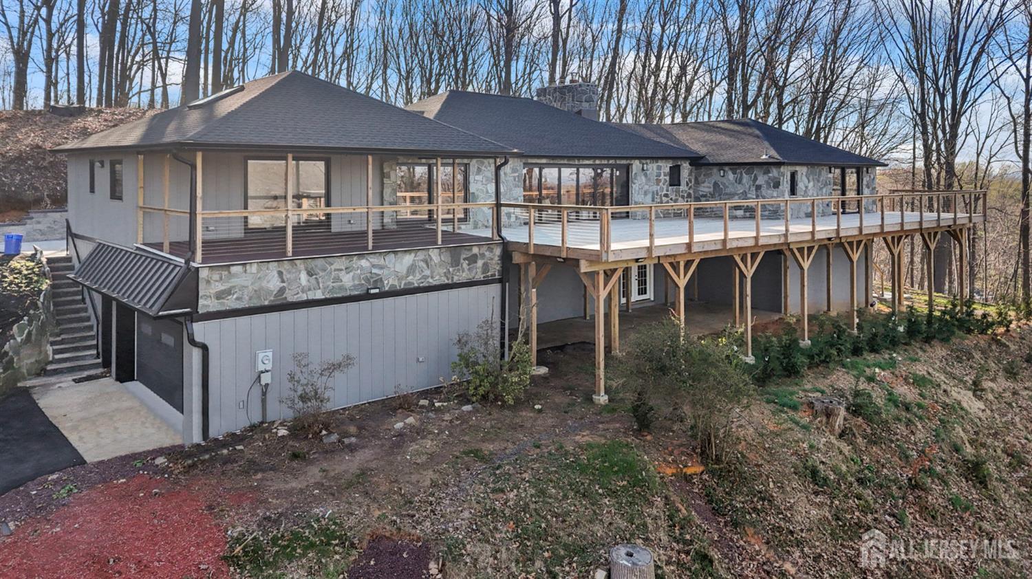 120 Nolan Road Morganville, NJ 07751 - Photo 60 of 85 a front view of a house with yard and seating space