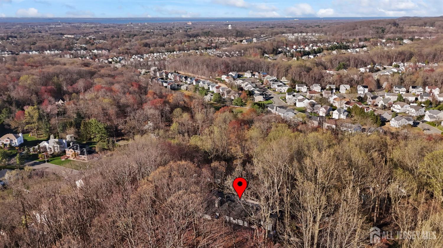 120 Nolan Road Morganville, NJ 07751 - Photo 74 of 85 an aerial view of house with yard and mountain view in back