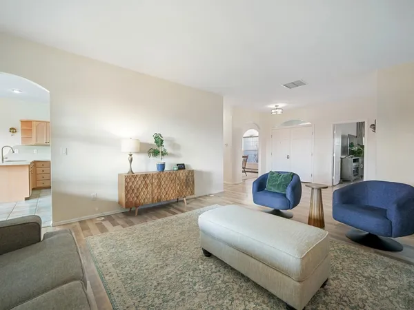 a living room with furniture and a couch