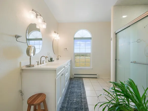 a room with a chair and a window