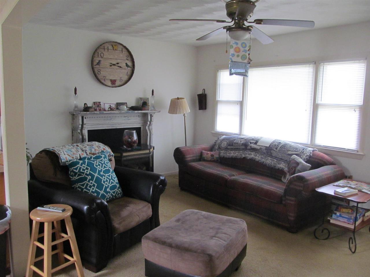 2240 Pepper Road Mount Jackson, VA 22842 - Photo 2 of 33 a living room with furniture a window and a fireplace