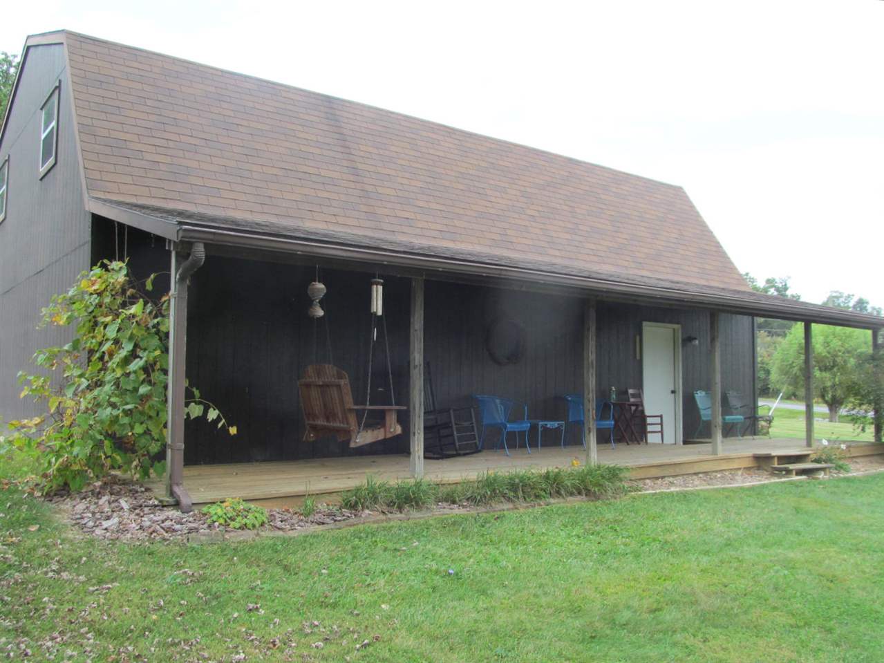 2240 Pepper Road Mount Jackson, VA 22842 - Photo 21 of 33 a front view of a house with a garden