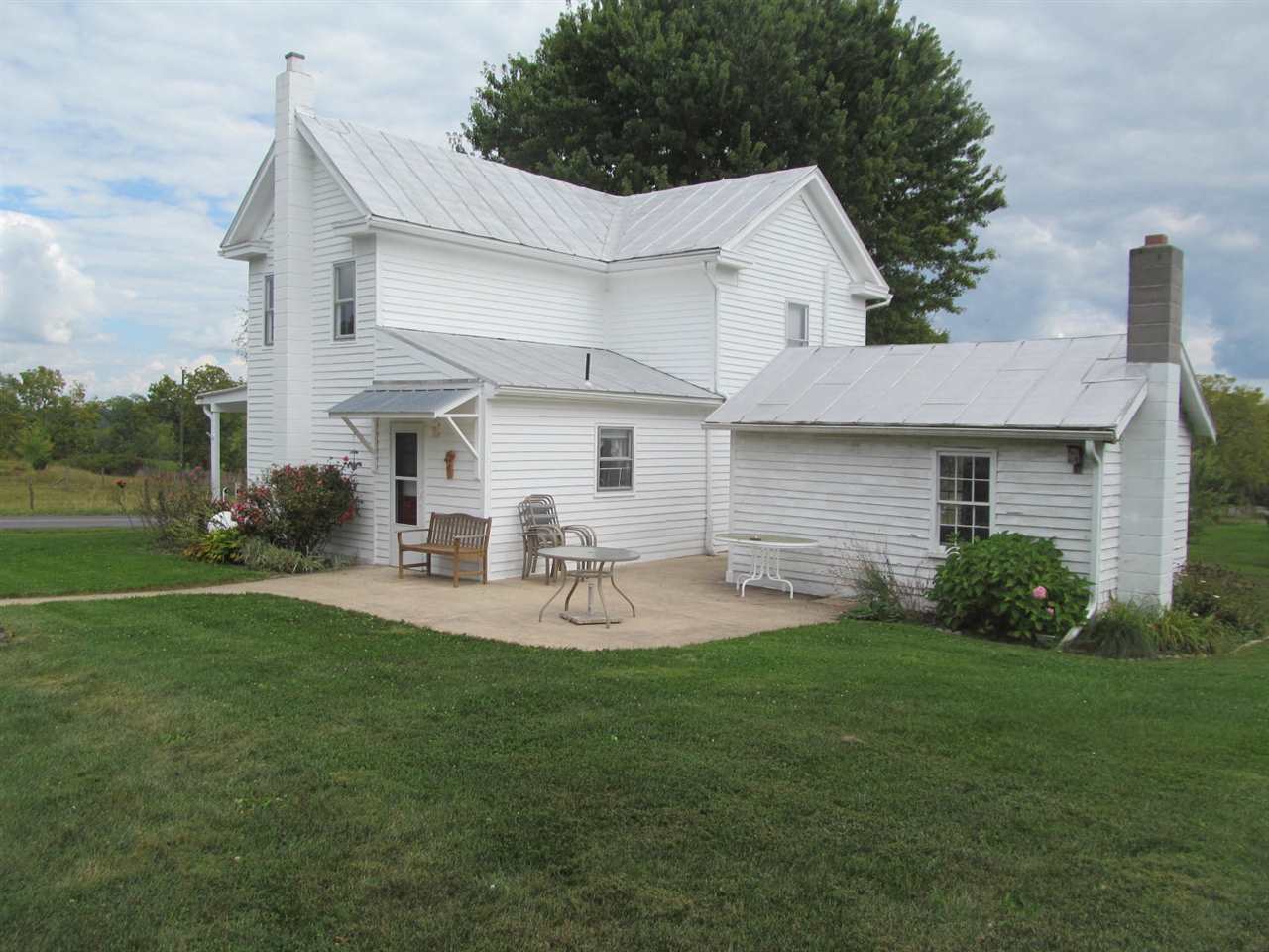2240 Pepper Road Mount Jackson, VA 22842 - Photo 22 of 33 a front view of a house with garden and patio
