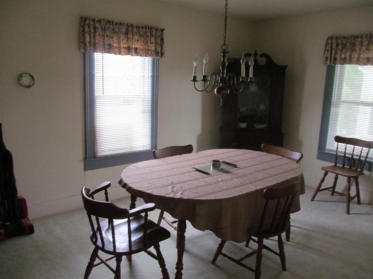2240 Pepper Road Mount Jackson, VA 22842 - Photo 4 of 33 a dining room with a table chairs and a chandelier
