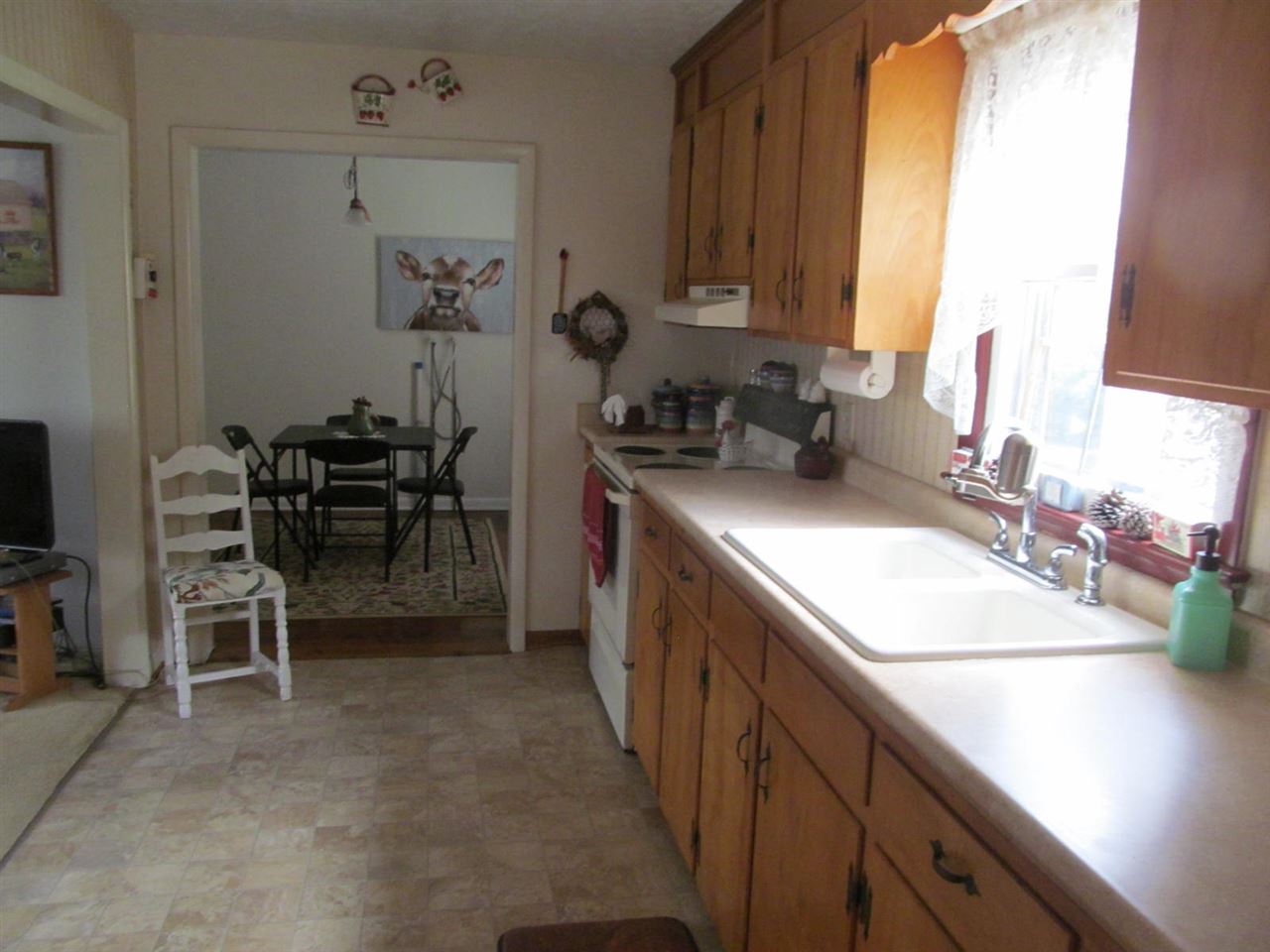 2240 Pepper Road Mount Jackson, VA 22842 - Photo 6 of 33 a kitchen with sink cabinets and window