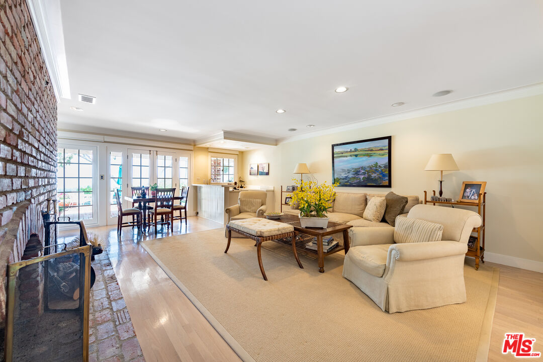 16331 Tudor Drive Encino, CA 91436 - Photo 12 of 71 a living room with furniture and a wooden floor