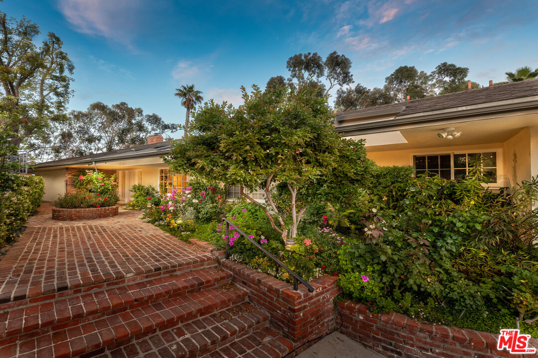 16331 Tudor Drive Encino, CA 91436 - Photo 2 of 71 a view of a house with a yard