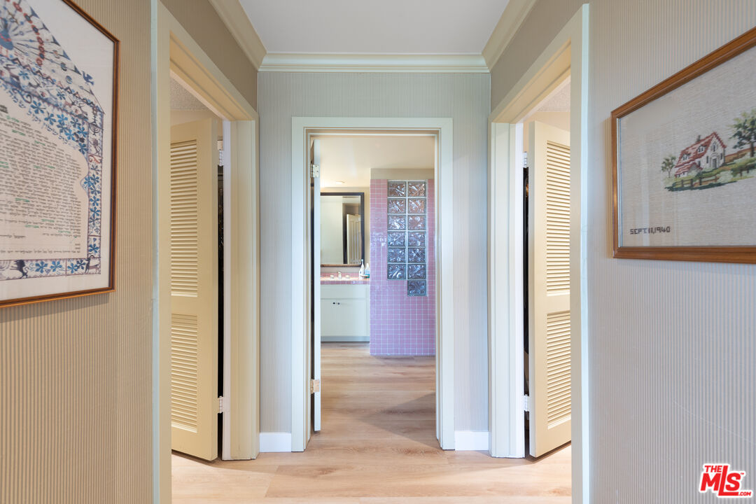 16331 Tudor Drive Encino, CA 91436 - Photo 21 of 71 a view of a hallway with wooden floor and closet