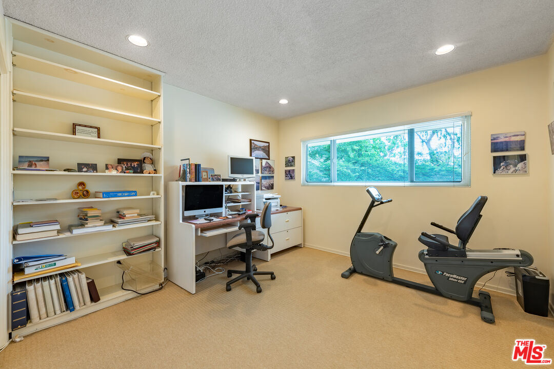 16331 Tudor Drive Encino, CA 91436 - Photo 26 of 71 a view of a workspace with furniture and a window