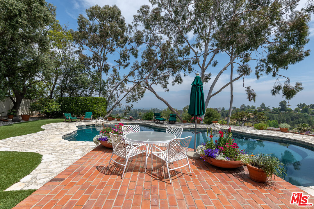 16331 Tudor Drive Encino, CA 91436 - Photo 35 of 71 a view of backyard with sitting area