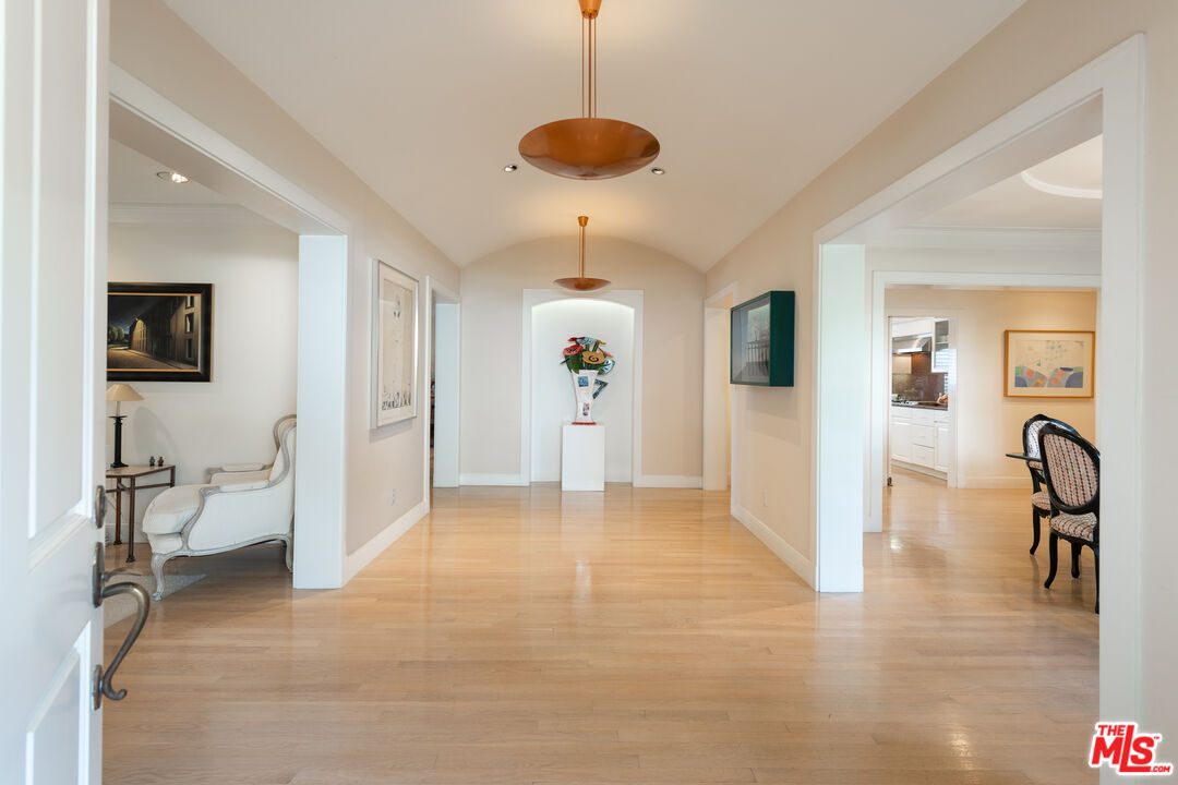 16331 Tudor Drive Encino, CA 91436 - Photo 5 of 71 a view of a livingroom with furniture wooden floor and a ceiling fan