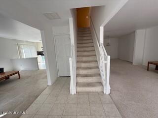 284 Brookfield Drive Jackson, NJ 08527 - Photo 5 of 17 a view of an entryway with wooden floor and a cabinet